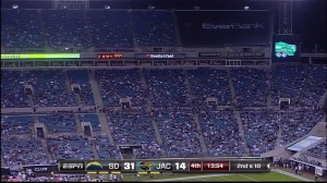 A tarp covers unsold seats during a largely unattended  Monday Night Football game in Jacksonville